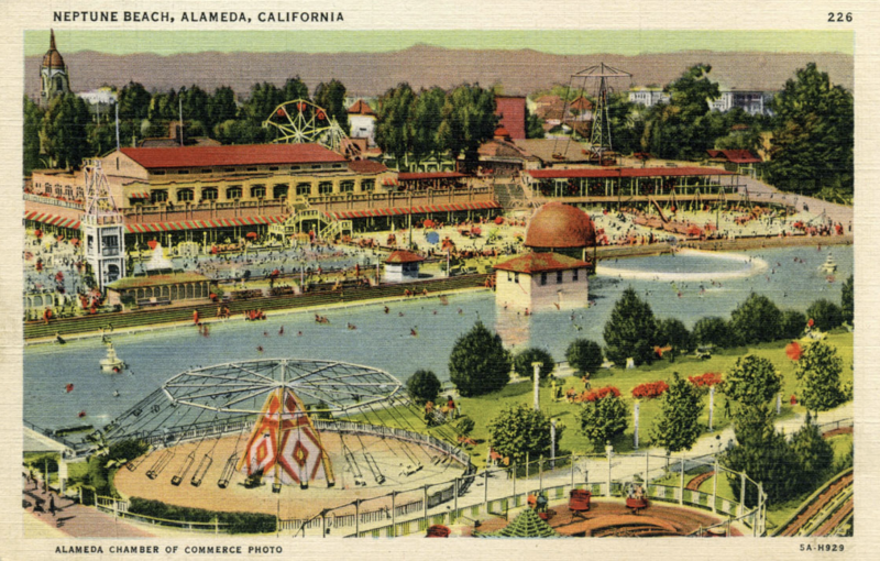 An old postcard depicts one giant swimming pool, and a smaller one next to it, surrounded by green space and fairground attractions.