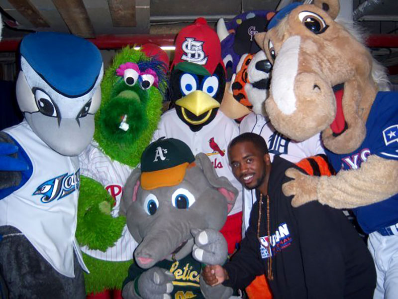 Five different baseball mascots pose around Pen Harshaw