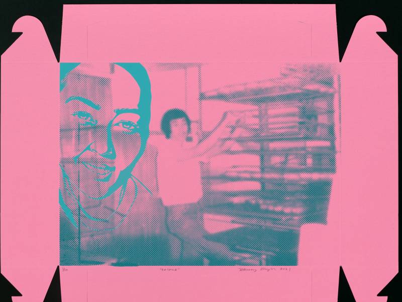 Silkscreened image of a woman in a bakery, on a pick donut box