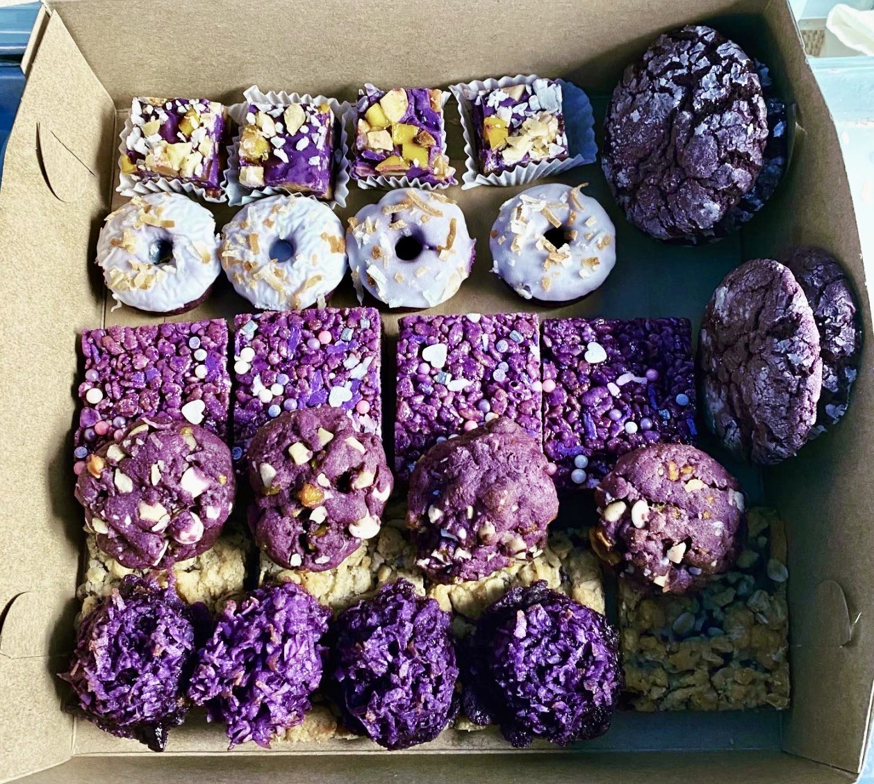 A box of purple ube baked treats from Buko Bakes
