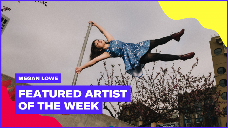 Dancer in blue dress hangs sideways from street pole in outdoor setting. Text reads "Megan Lowe: Featured Artist of the Week"