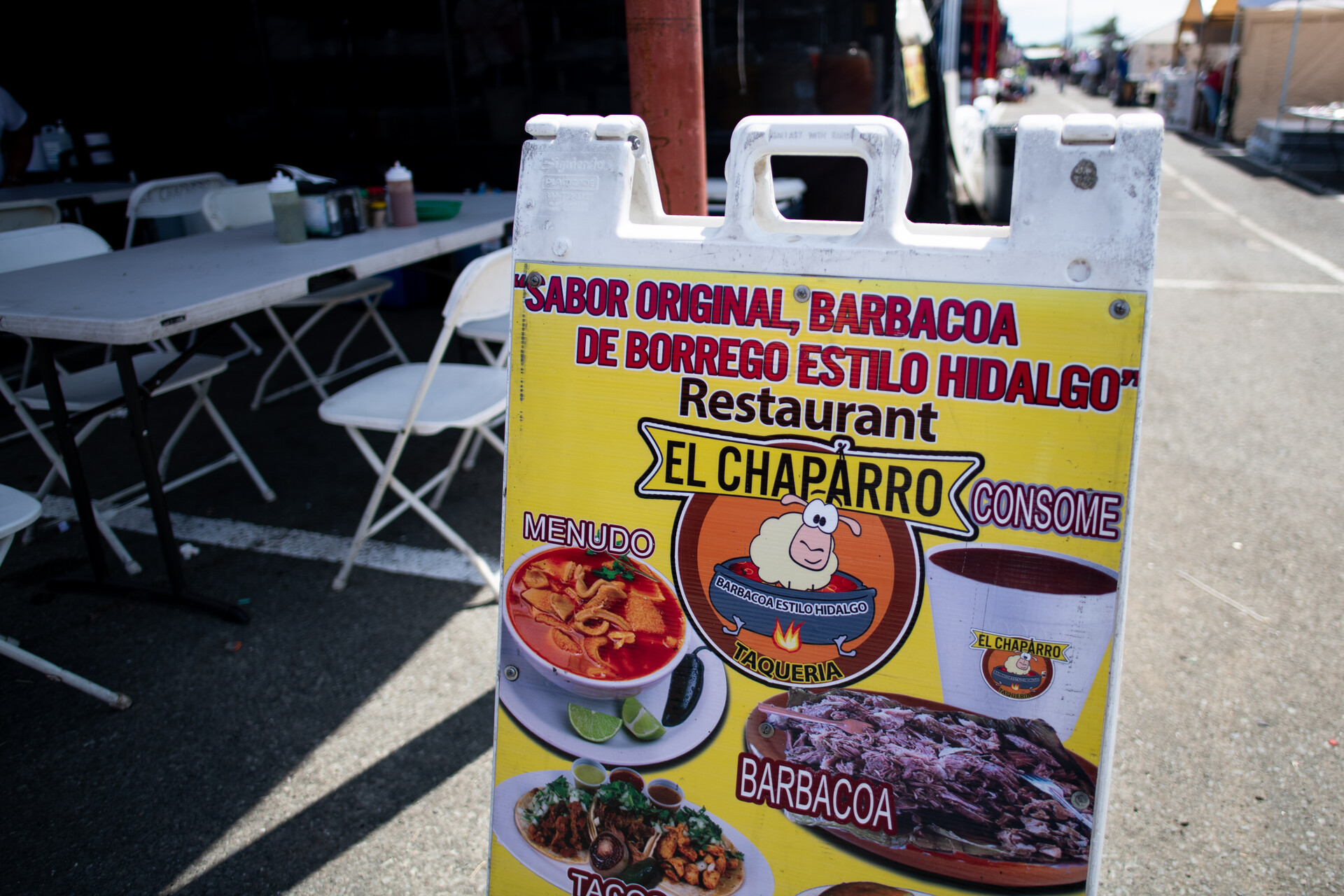 A signboard for El Chaparro, a barbacoa stand in the flea market.