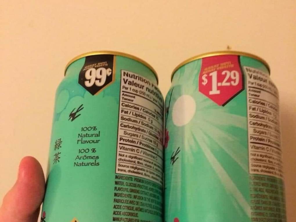 Two cans of AriZona iced tea sit side-by-side. One is labeled 99¢, the other $1.29.
