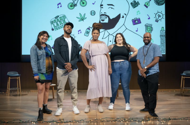 The Rightnowish comedy night crew! Marisol Medina-Cadena, Mike Evans Jr., Dara M. Wilson, Jackie Keliiaa, Pendarvis Harshaw pose for a photo on stage at KQED.