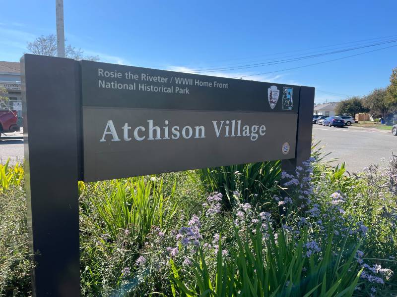 A National Park State sign that reads Atchison Village