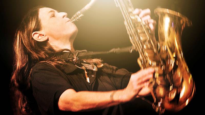 Saxophonist Jean Fineberg plays a solo.