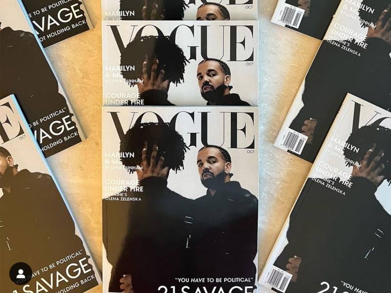 Nine fake Vogue magazines, featuring Drake and 21 Savage on the cover, arranged in a fan formation.