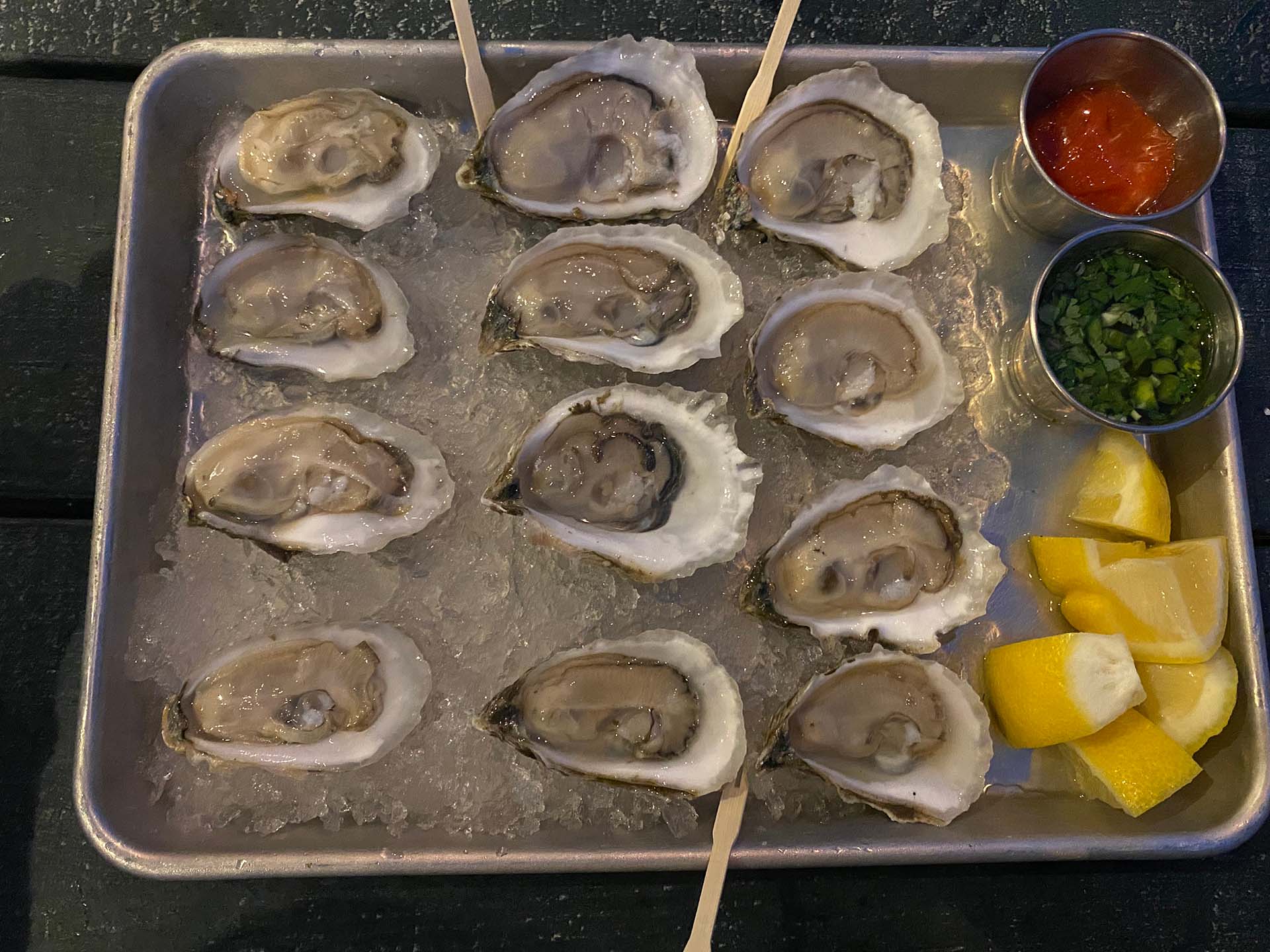 A tray of oysters on ice.