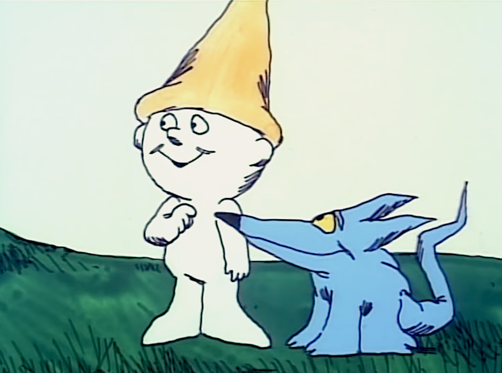 a screenshot from an animated movie of a boy in a pointed cap and a blue dog