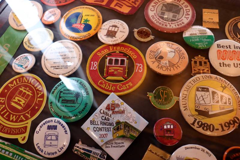 A collection of vintage Muni patches and pins at the SF Railway Museum