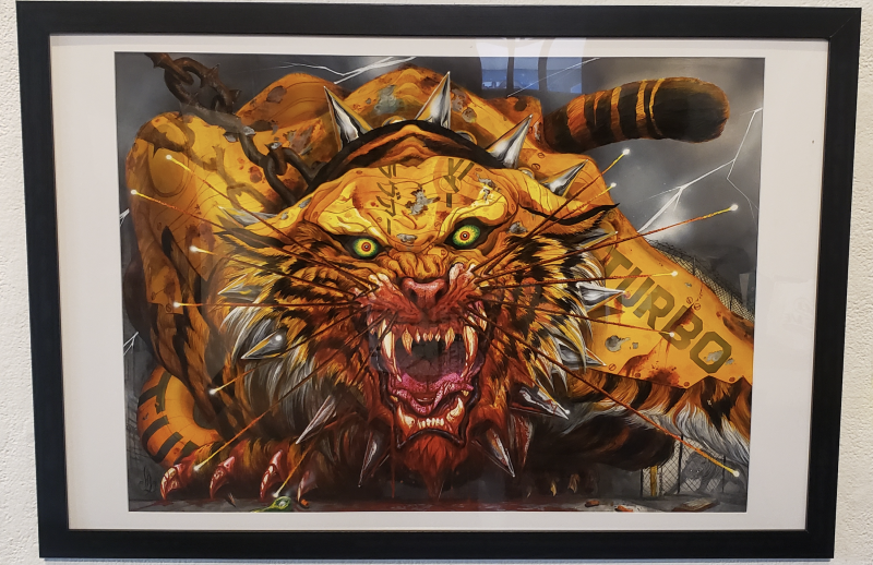 a painting depicts an aggressive tiger, teeth bared, eyes glowing yellow, as it prowls across the canvas.