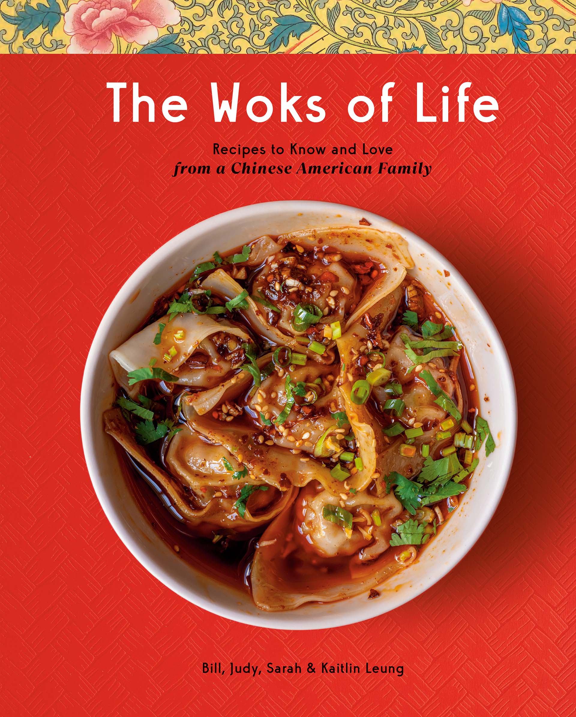 Cover of The Woks of Life cookbook shows a bowl of spicy wontons against a red backdrop.