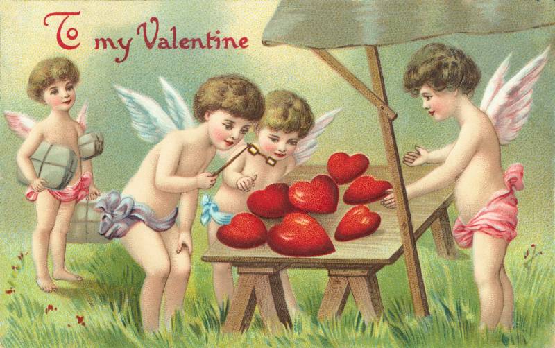 A Victorian-era greeting card featuring four cherubs gathering around and examining a table of hearts.