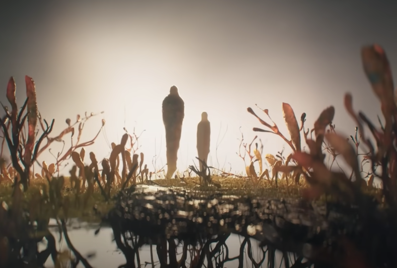 Two abstract figures stand on a strange horizon, a dark pool at their feet, unusual plants surrounding them on all sides.