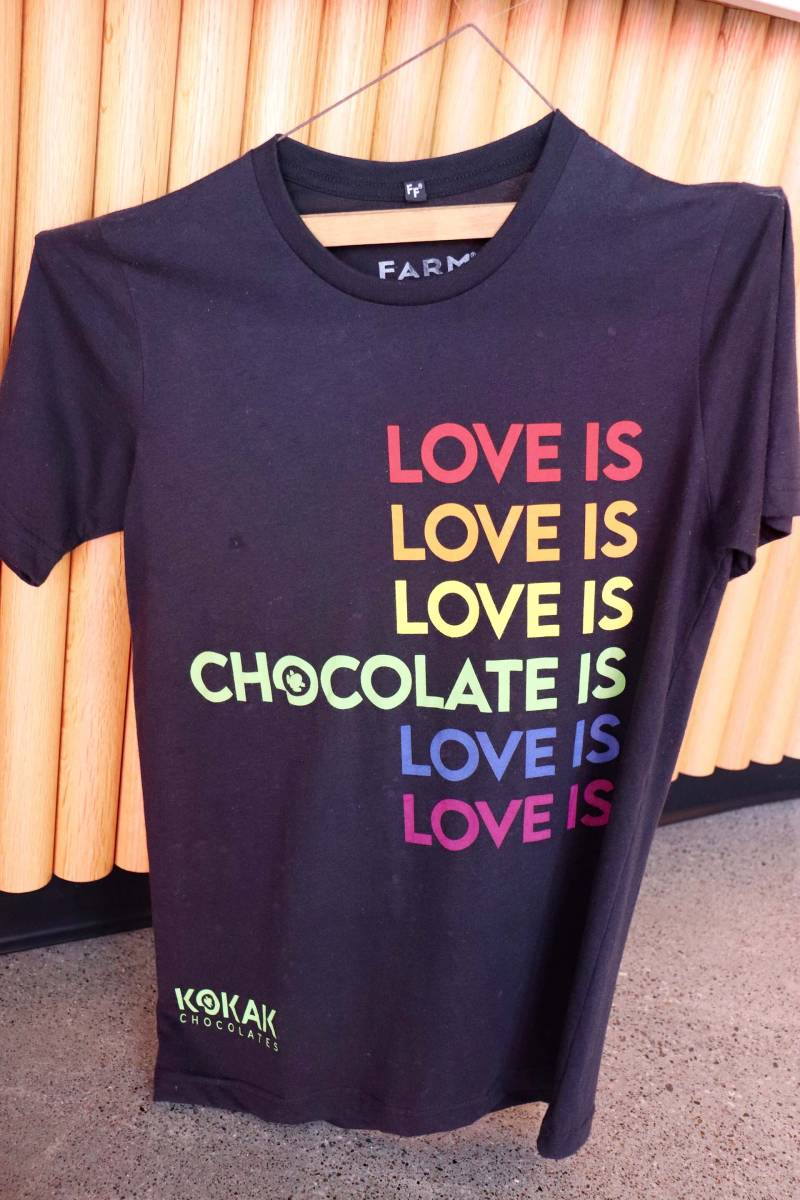 a t-shirt at Kokak reads: "love is love is love is chocolate is love..."