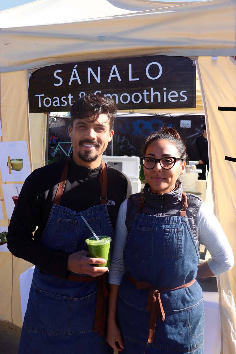 two local siblings sell smoothies and granola at the market every Sunday