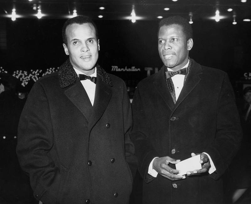 Two Black men in the 1960s dressed in formal evening wear.