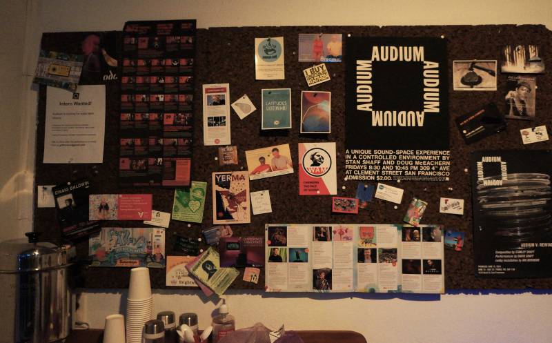 A board is filled with different notes, brochures and notices at Audium.