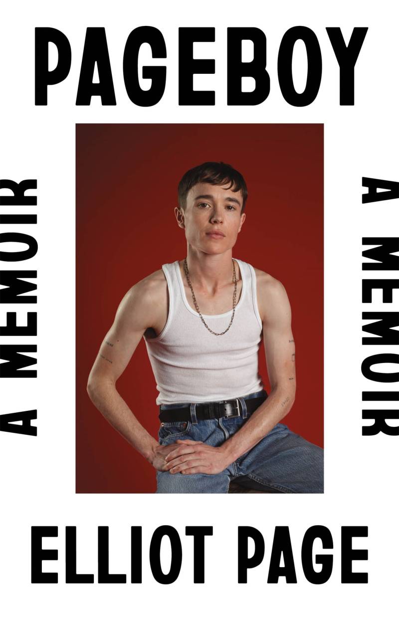 A book cover showing a youthful transgender man wearing blue jeans and a white tank top, and sitting in front of a red backdrop.