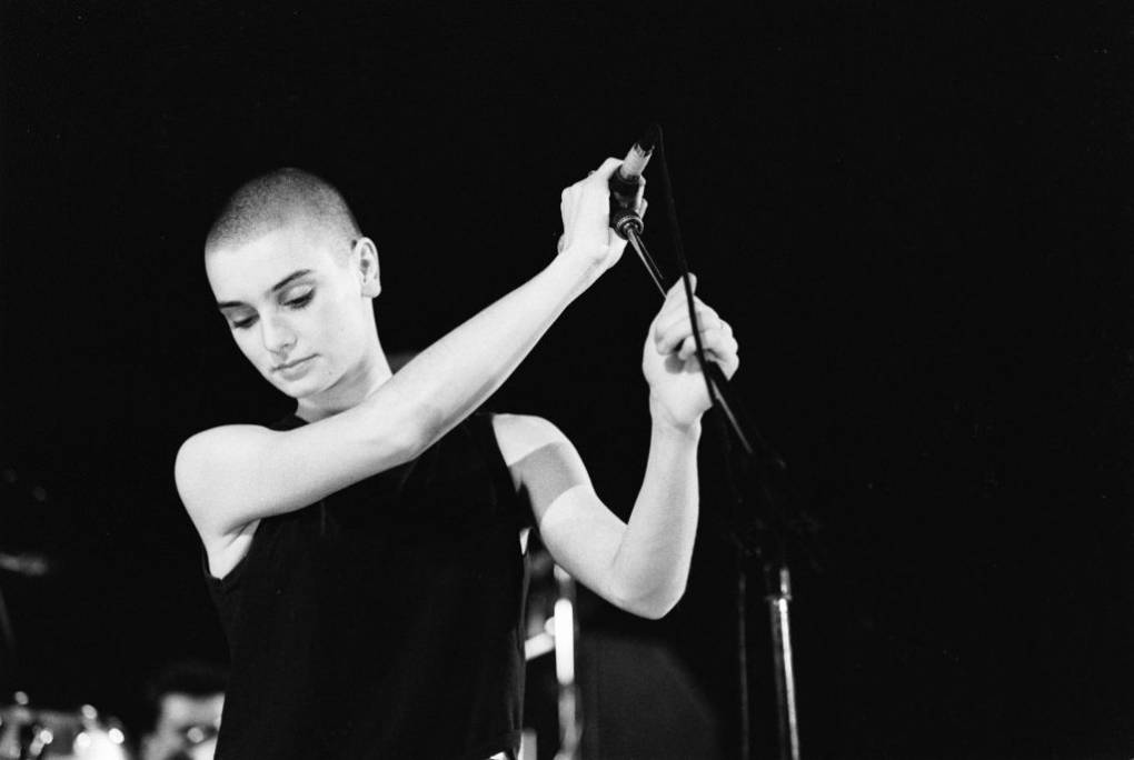 a black and white photo of singer Sinead O'Connor