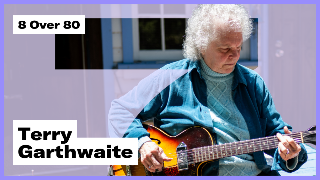 An older woman with white hair plays a guitar with the text "8 Over 80" and "Terry Garthwaite" overlaid
