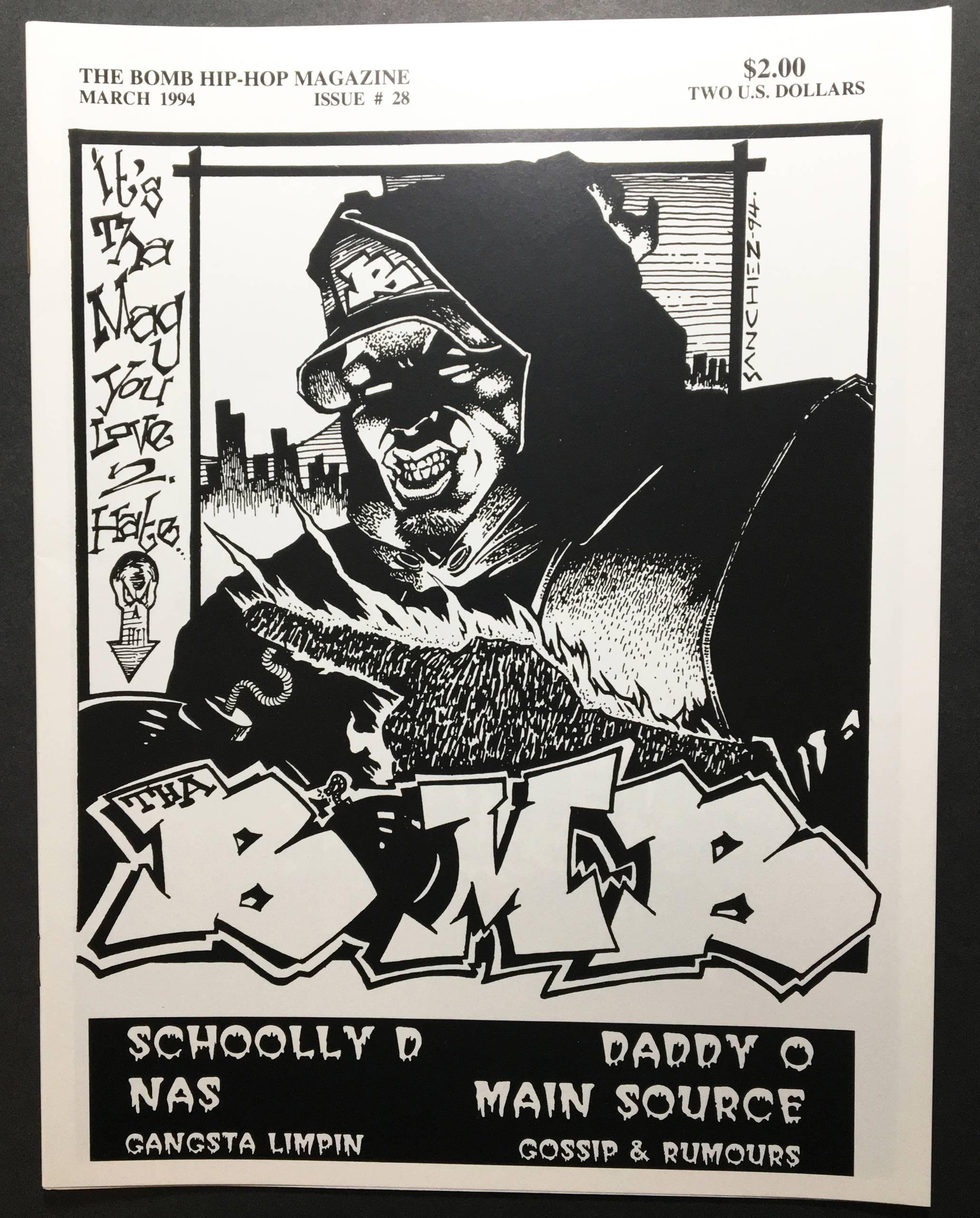 A black-and-white, illustrated zine cover features a menacing figure in a hoodie, the words "the mag you love to hate," and the title 'The Bomb' in graffiti letters.