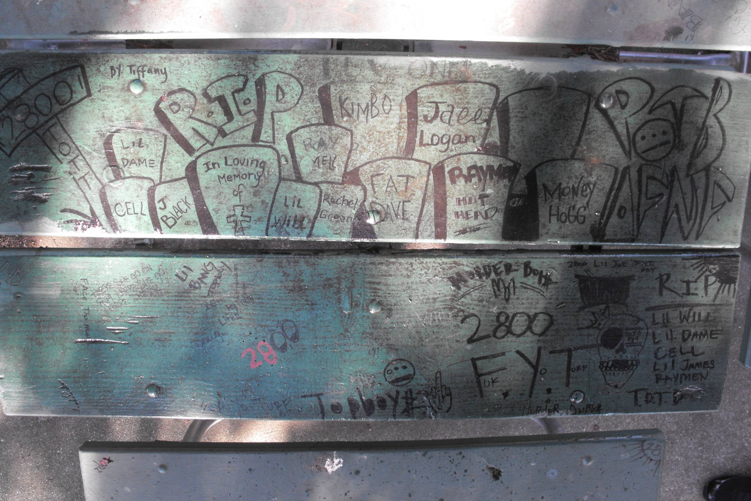 A park bench in the Dubs, pictured in 2011, memorializes loved ones from the neighborhood.