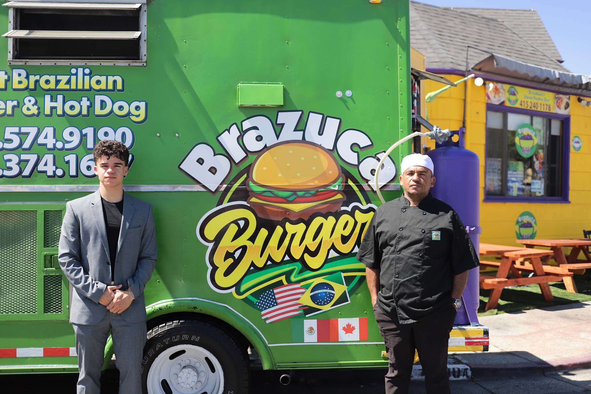 a 21-year-old man and his father stand in front of their food truck, which reads "Brazuca Burger"