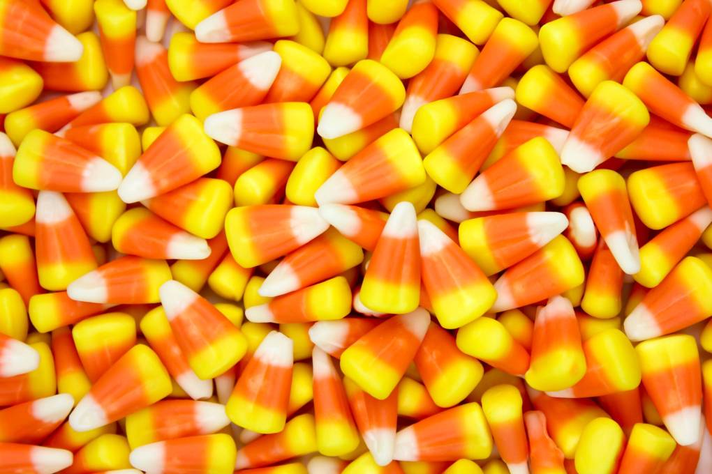 A densely packed photo containing only pieces of candy corn.