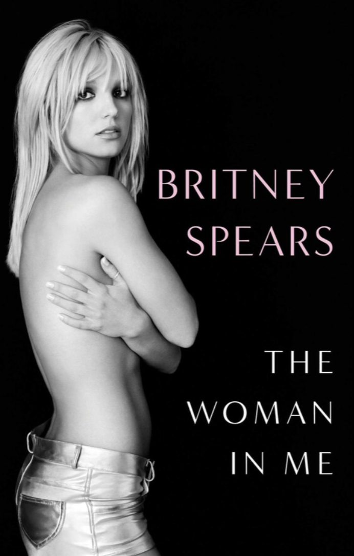 A book cover featuring a black and white photo of a young blonde woman standing in profile, topless, with her arms folded across her chest. Her face is pensive.