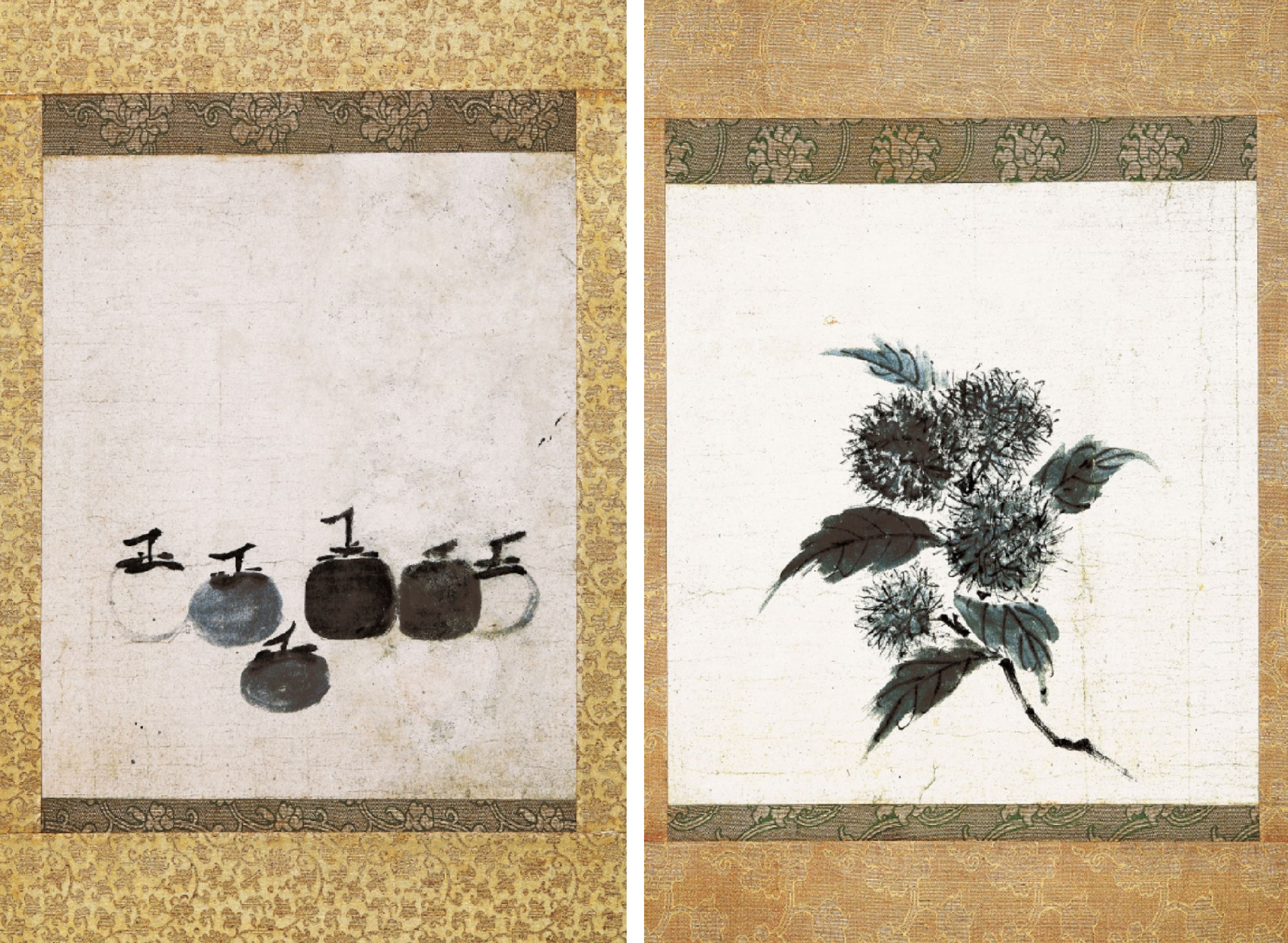 Two ink paintings in fabric borders; left of six persimmons of varying shapes and colors, right of a branch with leaves and chestnuts