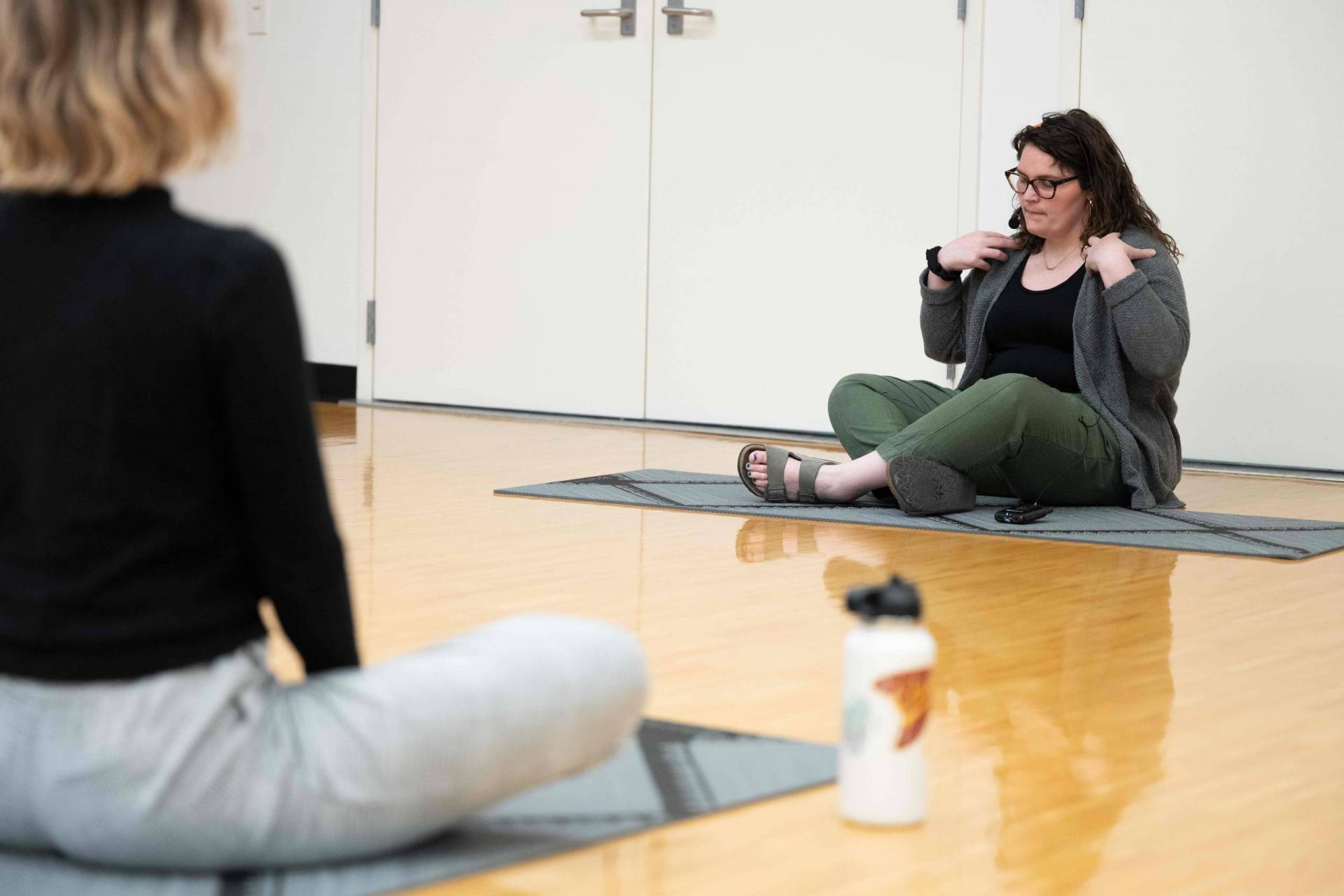 Instructor leading mindfulness practices