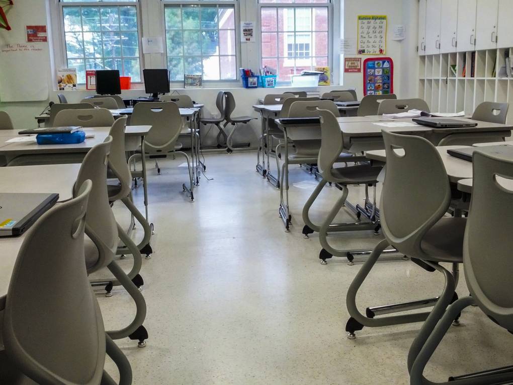 Desks in an empty classroom