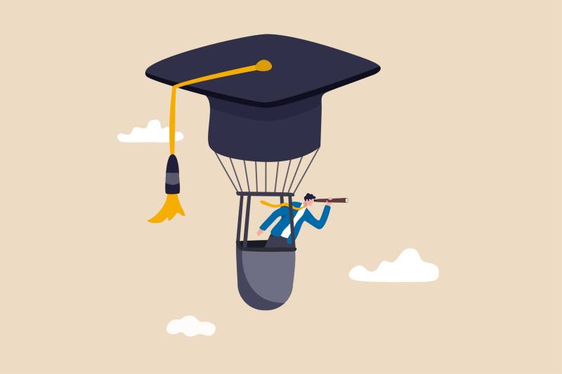 Illustration of a hot air balloon where the balloon is in a graduation cap. A man is in the basket peering out of a telescope.