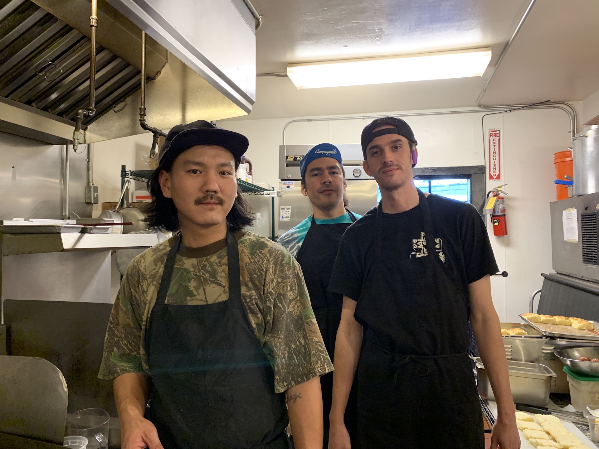 Lovely's chef Mikey Yoon along with Javi Palacios and Cameron Kauzer working a pop-up at Eli's Mile High Club.