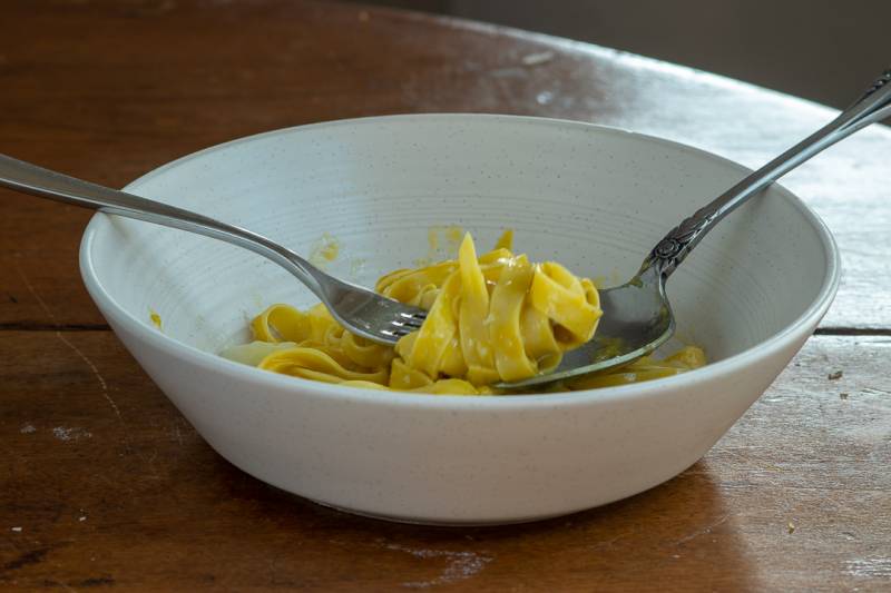 Bowl of pasta with a fork