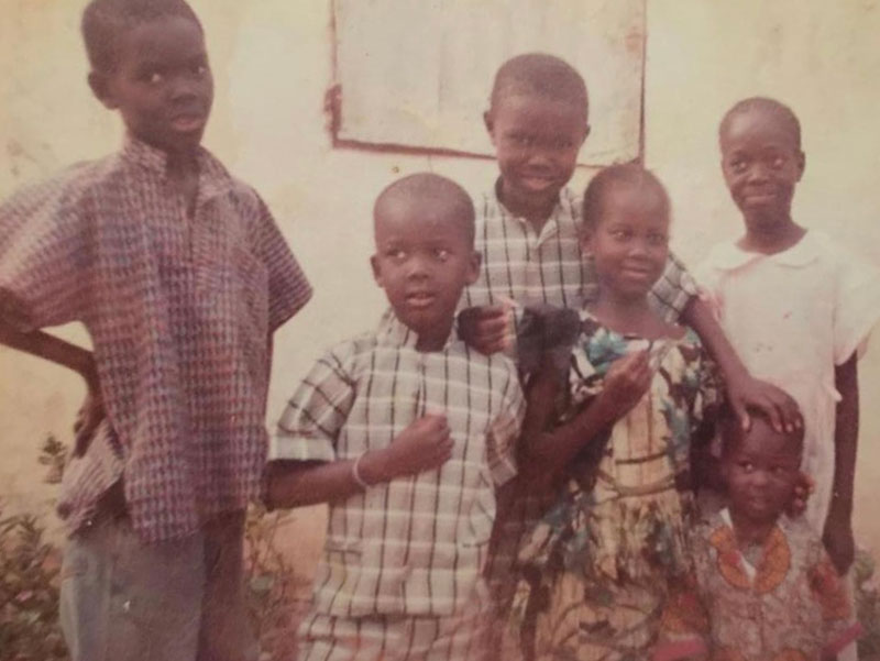 Oumar Diouf with siblings in Senegal.