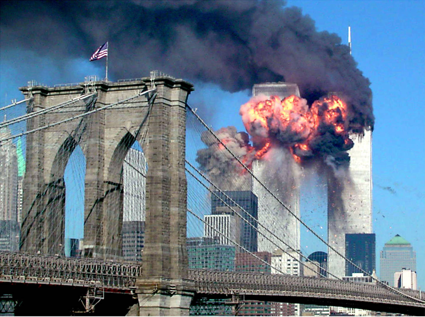 The second tower of the World Trade Center bursts into flames after being hit by a hijacked airplane in New York on September 11, 2001. REUTERS/Sara K. Schwittek