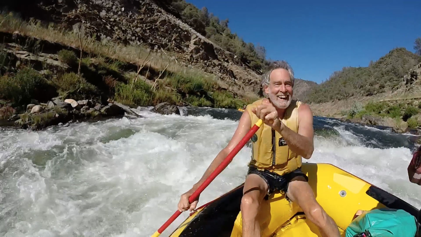 Mark Dubois rafting the Stanislaus for the first time in more than three decades. Dubois is considered an icon among river advocates. Craig Miller/KQED