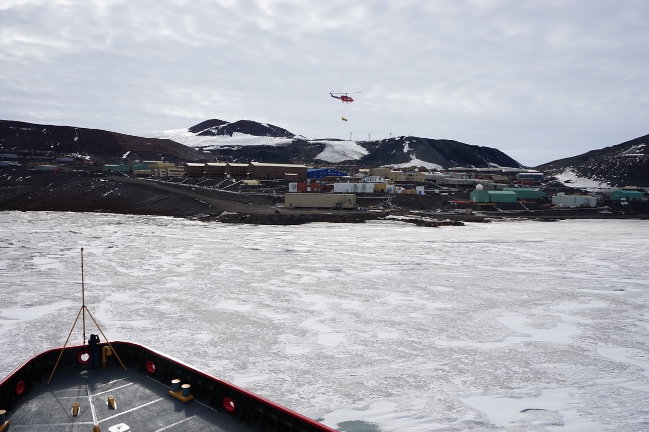 Polar Star approaches the icebound McMurdo research station on Ross Island, Antarctica. Brandon R. Reynolds