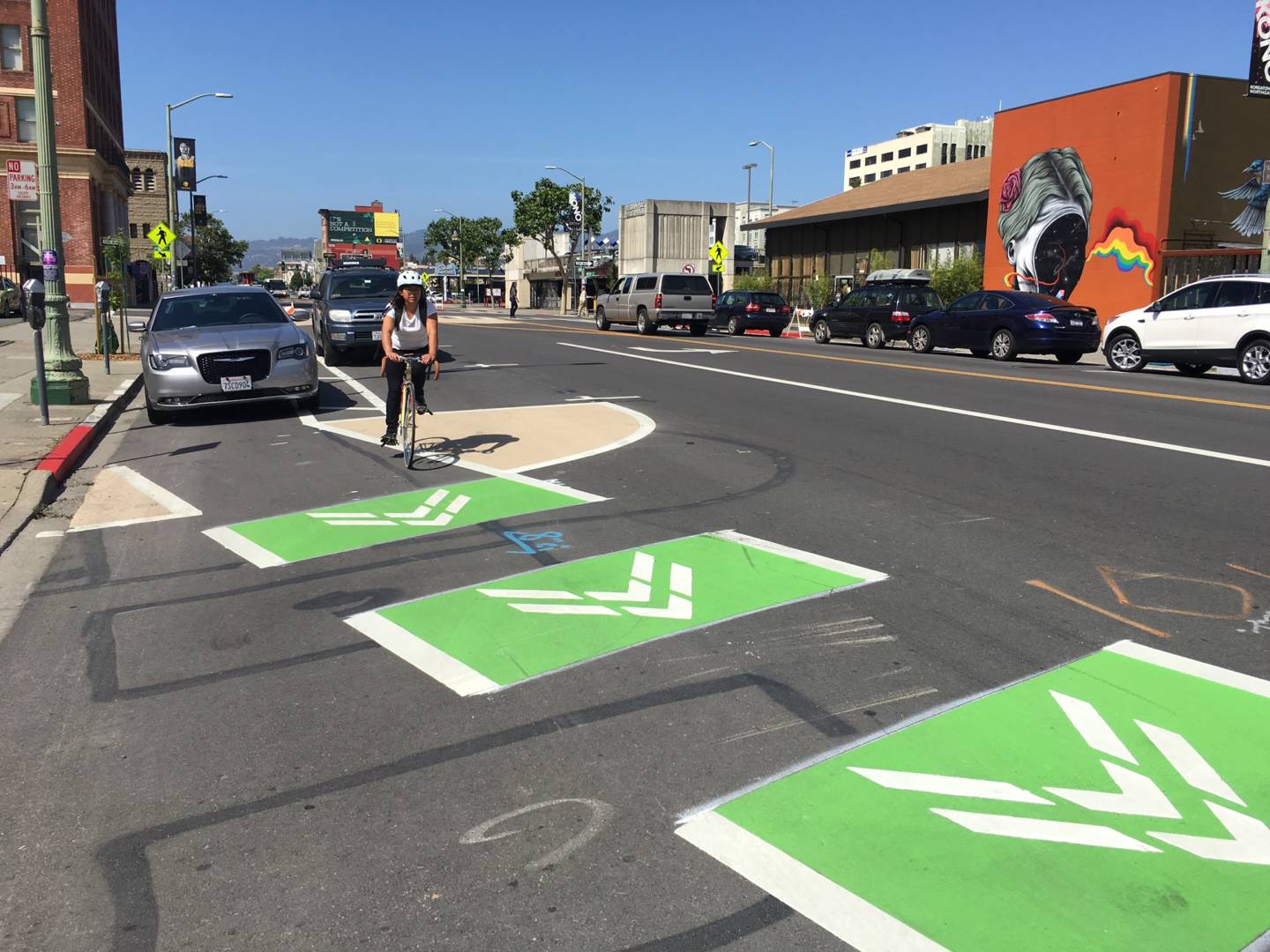 A cyclist cruises down a new dedicated bike lane on Telegraph Avenue in Berkeley.  Andrea Kissack/KQED