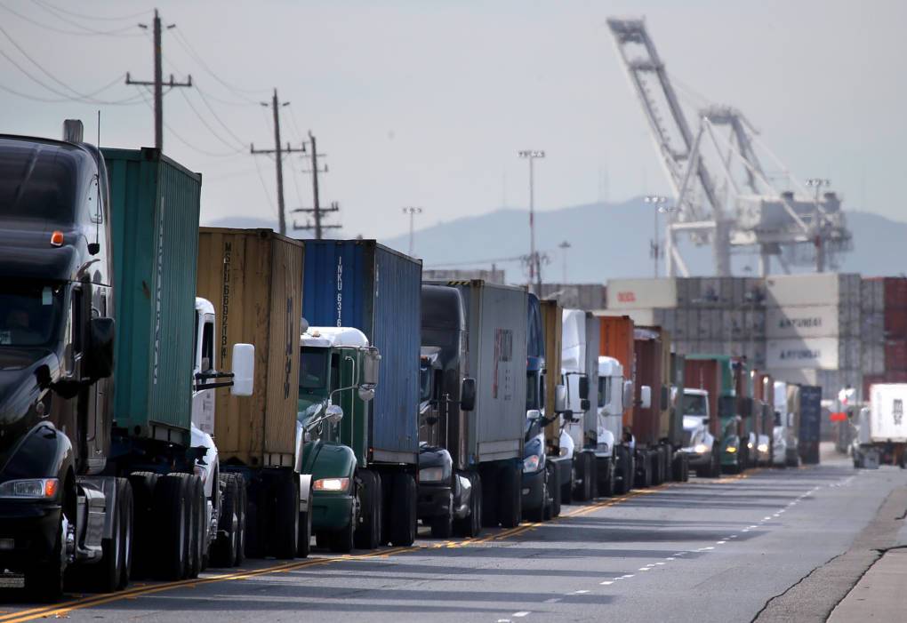 Trucks line up to enter a berth at the Port of Oakland on February 11, 2015 in West Oakland, California.