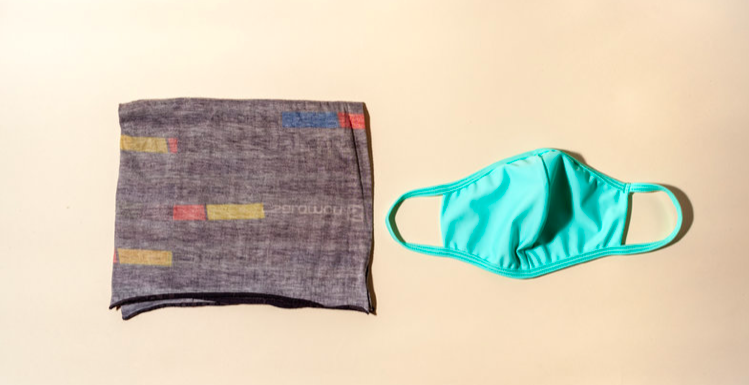 A gray neck gaiter with small yellow, red and blue bands of color, and a turquoise cloth mask. with fabric ear handles.