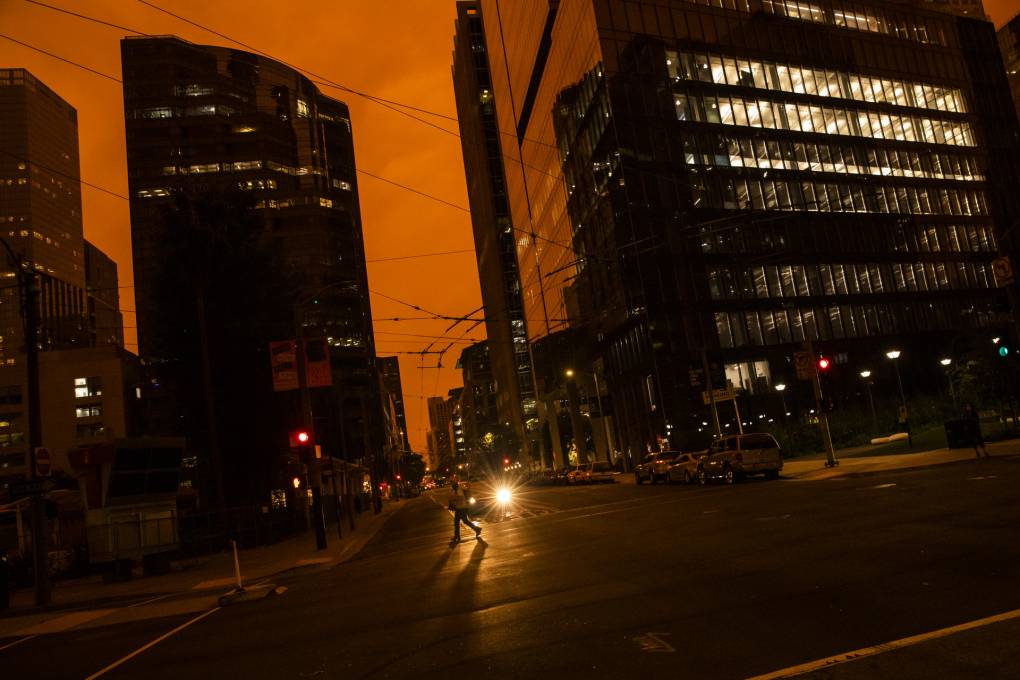 An orange glow is seen over a darkened Howard Street as smoke from various wildfires burning across Northern California mixes with the marine layer on Sept. 9, 2020 in San Francisco, California.   Philip Pacheco/Getty Images