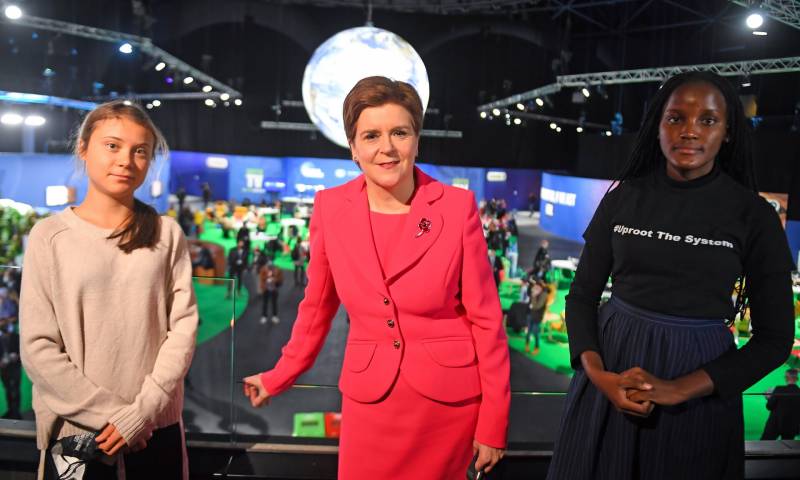 Scotland's First Minister Nicola Sturgeon poses for a photograph during her meeting with climate activists Vanessa Nakate of Uganda and Greta Thunberg of Sweden, during the COP26 UN Climate Change Conference on November 1, 2021 in Glasgow, United Kingdom. The conference will run from 31 October for two weeks, finishing on 12 November. It was meant to take place in 2020 but was delayed due to the Covid-19 pandemic.