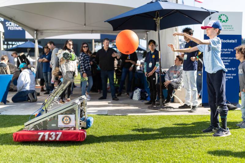 Robot toss at Oracle Park during the Bay Area Science Festival (Bay Area Science Festival)