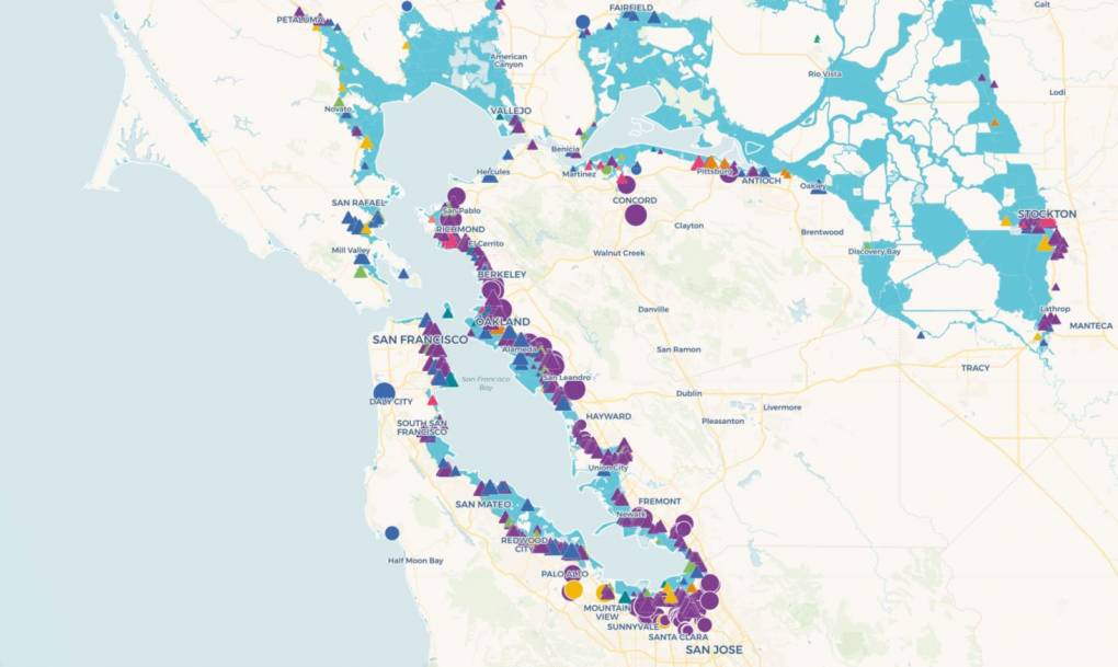 A map of the Bay Area and inland California. Scattered across it are red, blue, orange and green triangles and circles each representing a toxic site that could be impacted by sea level rise.