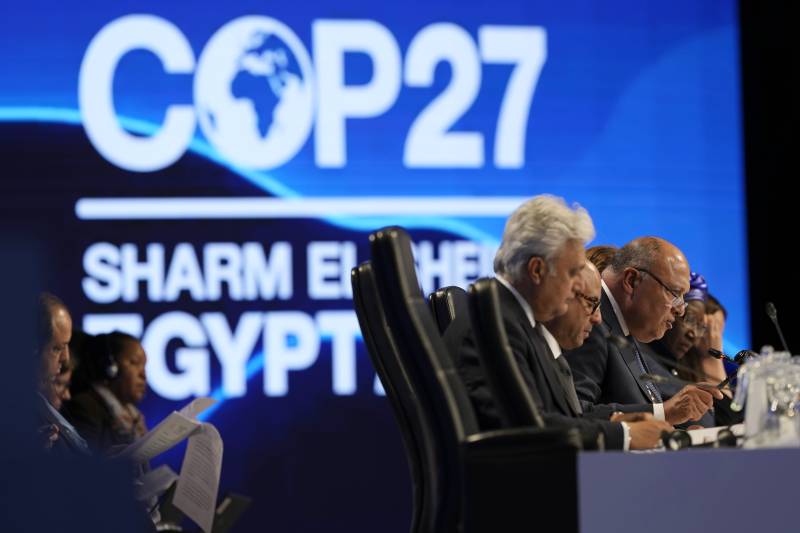Sameh Shoukry, president of the COP27 climate summit, right, speaks during a closing plenary session at the U.N. Climate Summit, Sunday, Nov. 20, 2022, in Sharm el-Sheikh, Egypt.