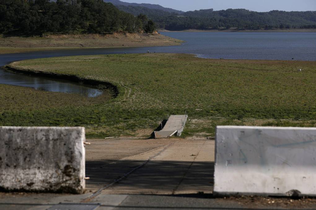 A boat dock sits on dry ground far from the water at Lake Mendocino on April 22, 2021 in Ukiah, California.