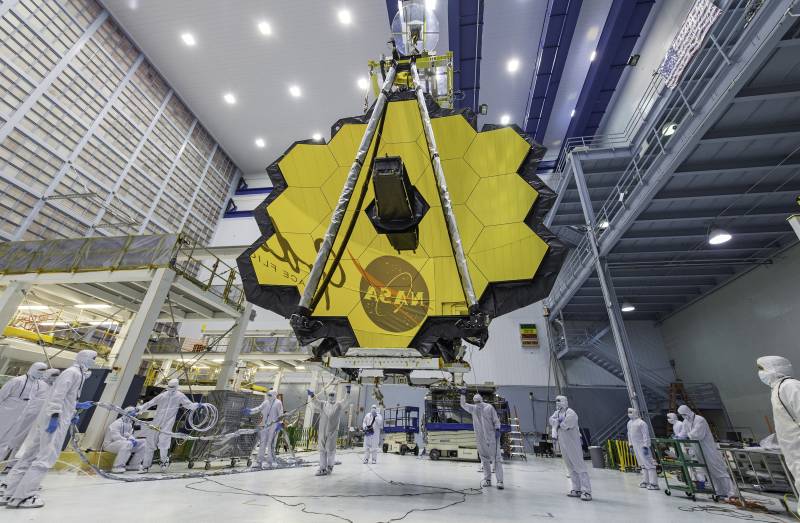 Technicians lift the mirror of the James Webb Space Telescope using a crane at the Goddard Space Flight Center in Greenbelt, Md.